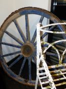 TWO VINTAGE WOODEN CART WHEELS.