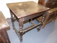 AN 18th.C.AND LATER OAK SIDE TABLE WITH BOBBIN TURNED LEGS AND STRETCHER. W.66cms.