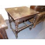 AN 18th.C.AND LATER OAK SIDE TABLE WITH BOBBIN TURNED LEGS AND STRETCHER. W.66cms.