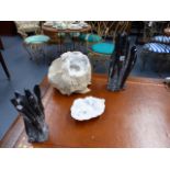 A LARGE CRYSTAL CENTRED GEODE SPECIMEN AND TWO POLISHED FOSSIL SCULPTURES.