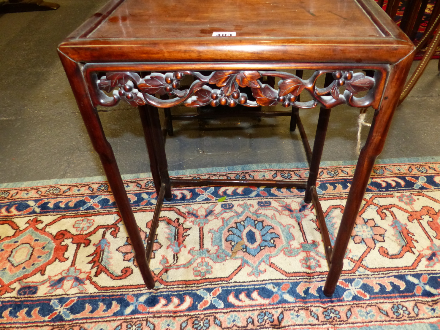 A NEST OF FOUR CHINESE CARVED HARDWOOD TABLES WITH PIERCED FOLIATE APRONS. - Image 15 of 19