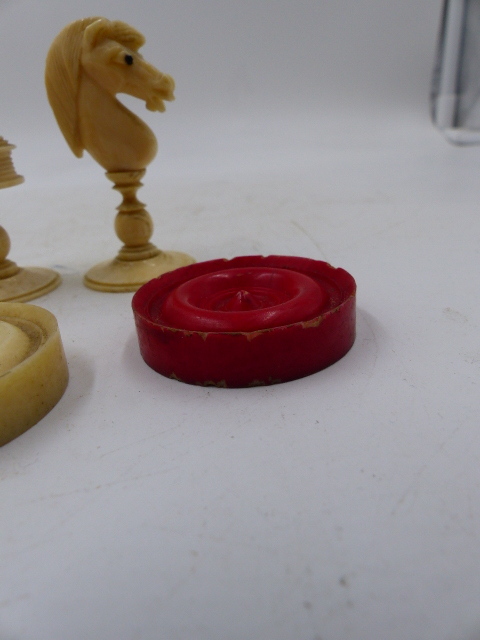 THREE ANTIQUE CARVED AND STAINED IVORY AND BONE BOARD GAME PIECES, TWO CHESS SETS AND A SET OF - Image 30 of 86