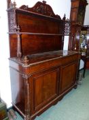 A CONTINENTAL VICTORIAN CARVED ROSEWOOD CONSOLE CABINET, TWO TIER SUPERSTRUCTURE ABOVE TWO DRAWERS