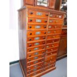 AN ANTIQUE SPECIMEN COLLECTOR'S CHEST OF TWENTY SIX DRAWERS, EACH WITH GLAZED COVER.