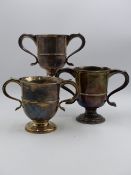 THREE SIMILAR SILVER HALLMARKED TWO HANDLED CUPS, ONE 1739 LONDON, RICHARD BAYLEY, HEIGHT 13.5cms,