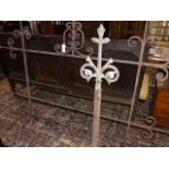 A 19th.C.WROUGHT IRON SIGN FRAME TOGETHER WITH A CAST IRON FLEUR DE LYS ROOF FINIAL. (2)