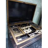 A CHINESE EXPORT LACQUER WORK/WRITING BOX WITH FITTED INTERIOR AND BASE DRAWER ENCLOSING WRITING
