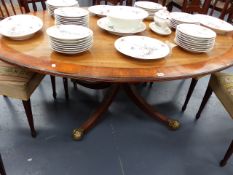 A LARGE EARLY 19th.C.MAHOGANY AND CROSS BANDED OVAL TILT TOP BREAKFAST TABLE ON SWEPT QUADRUPED LEGS