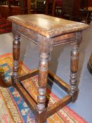 AN OLD ANTIQUE STYLE OAK JOINT STOOL. W.36cms.