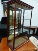 A LATE VICTORIAN MAHOGANY FRAMED SHOP COUNTER DISPLAY CABINET WITH MIRRORED REAR DOOR.
