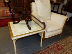 A CARVED FRENCH GILTWOOD LOUIS XVI STYLE GENTLEMAN'S LIBRARY ARMCHAIR AND A GILT DECORATED FAUX