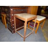 AN ART DECO CANE TOP DRESSING STOOL TOGETHER WITH AN UPHOLSTERED EXAMPLE AND A SIMILAR OAK