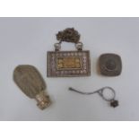 AN EASTERN WHITE METAL GHAO BOX TOGETHER WITH AN OPIUM FINGER PIPE, A SILVER TRINKET BOX AND A