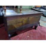 AN 18TH CENTURY AND LATER OAK AND ELM PLANK COFFER