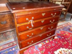 A MAHOGANY GEORGIAN STYLE SMALL CHEST WITH BRUSHING SLIDE, FOUR GRADUATED DRAWERS AND BRACKET FEET