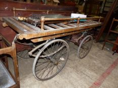 A LATE VICTORIAN OAK COACH BUILT FUNERAL BIER.