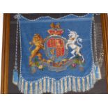 A VICTORIAN BEADWORK BANNER DECORATED WITH THE ORDER OF THE GARTER CREST MOUNTED IN BESPOKE GILT