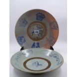 TWO CANTONESE PROVINCIAL SAUCER DISHES WITH BLUE DECORATION. LARGEST D.28.5cms.