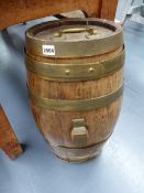 AN ANTIQUE BRASS BOUND SHERRY BARREL.