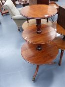 A 19th.C.MAHOGANY THREE TIER DUMB WAITER WITH DROP LEAVES ON SPLAYED SUPPORTS WITH BRASS CASTORS.