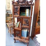 A GOOD CHINESE CARVED HARDWOOD DISPLAY CABINET WITH OVERALL FOLIATE AND BIRD DECORATION WITH PIERCED