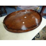 AN INLAID MAHOGANY GEORGIAN TWO HANDLE OVAL GALLERY TRAY WITH SCALLOPED RIM. W.72cms.