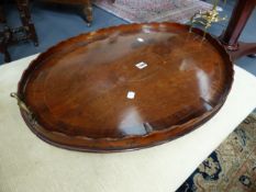 AN INLAID MAHOGANY GEORGIAN TWO HANDLE OVAL GALLERY TRAY WITH SCALLOPED RIM. W.72cms.