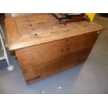 A LARGE CONTINENTAL OAK BLANKET/STORAGE CHEST WITH IRON CARRYING HANDLES AND BINDINGS. W.113cms.