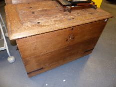 A LARGE CONTINENTAL OAK BLANKET/STORAGE CHEST WITH IRON CARRYING HANDLES AND BINDINGS. W.113cms.