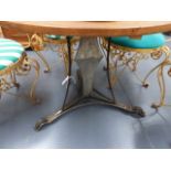A PAIR OF CONTEMPORARY WROUGHT IRON AND OAK TOPPED GARDEN TABLES. D.90cms.