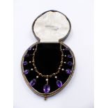 A PRECIOUS YELLOW METAL, TESTED AS GOLD, AMETHYST AND PEARL LAVALIER NECKLACE CONSISTING OF ELEVEN