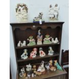 A GROUP OF POTTERY ANIMAL FIGURES AND SPILL VASES TO INCLUDE STAFFORDSHIRE GROUPS, SYLVAC, ROYAL