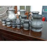 A GROUP OF 19th.C.AND OTHER PEWTER MEASURES, TANKARDS,ETC.
