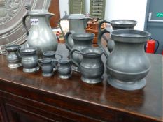 A GROUP OF 19th.C.AND OTHER PEWTER MEASURES, TANKARDS,ETC.