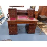 A VICTORIAN MAHOGANY TWIN PEDESTAL DICKENS DESK WITH RAISED DRAWERS OVER. W.137cms.
