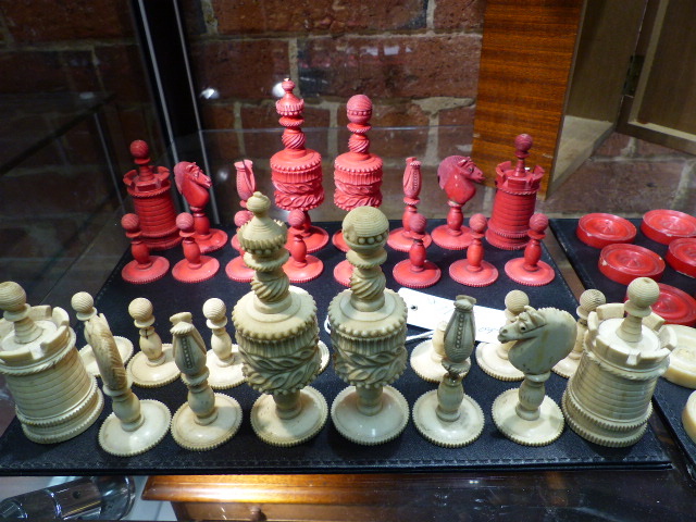 THREE ANTIQUE CARVED AND STAINED IVORY AND BONE BOARD GAME PIECES, TWO CHESS SETS AND A SET OF - Image 5 of 86