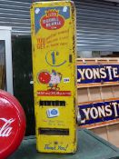 AN UNUSUAL VINTAGE DOUBLE BUBBLE GUM VENDING MACHINE.