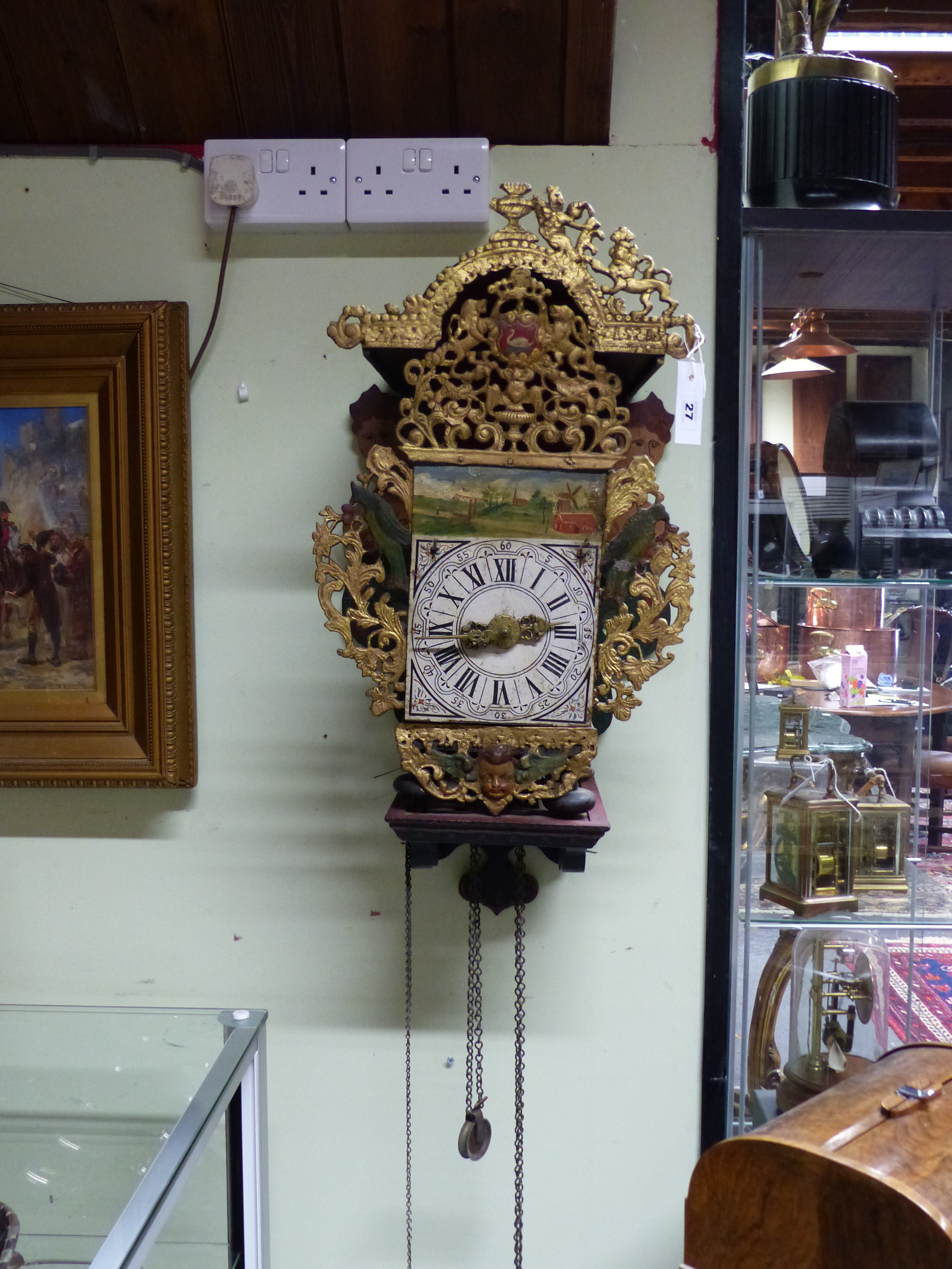 AN ANTIQUE DUTCH STAART WALL CLOCK WITH ORIGINAL PAINTED BRACKET AND PIERCED CAST METAL MOUNTS. - Image 2 of 2