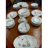 A CONTINENTAL ANTIQUE PORCELAIN PART DINNER SERVICE DECORATED WITH MEISSEN STYLE POLYCHROME BIRD AND