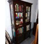 A 19th.C.WALNUT DISPLAY CABINET WITH FOUR SHAPED GLAZED PANEL DOORS ON OGEE BRACKET FEET. W.95cms.