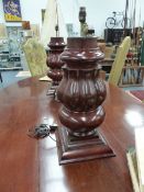 A PAIR OF LARGE MAHOGANY TABLE LAMPS. H.68cms.