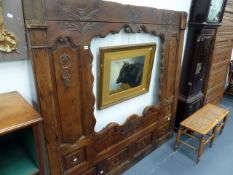 A FRENCH CARVED AND PANEL OAK FRAME. W.182 x H.172cms.