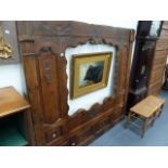 A FRENCH CARVED AND PANEL OAK FRAME. W.182 x H.172cms.