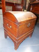 AN INLAID MAHOGANY GEORGIAN DOME TOP CELLARETTE WITH BRASS CARRYING HANDLES ON BRACKET FEET.