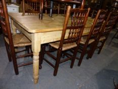 AN ANTIQUE PINE KITCHEN TABLE ON TURNED LEGS. 100x198cms.