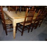 AN ANTIQUE PINE KITCHEN TABLE ON TURNED LEGS. 100x198cms.