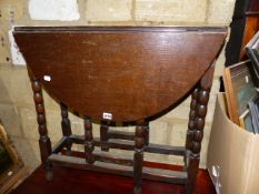 A 19th.C.OAK SMALL COTTAGE GATELEG TABLE WITH BOBBIN TURNED LEGS. W.76cms.