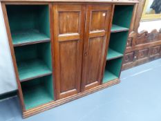 A VICTORIAN MAHOGANY BOOKCASE WITH CENTRAL PANELLED DOORS. W.140 x H.114cms.