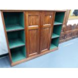 A VICTORIAN MAHOGANY BOOKCASE WITH CENTRAL PANELLED DOORS. W.140 x H.114cms.