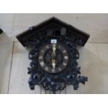 AN EARLY 20th.C.CARVED BLACK FOREST TYPE WALL CUCKOO CLOCK.